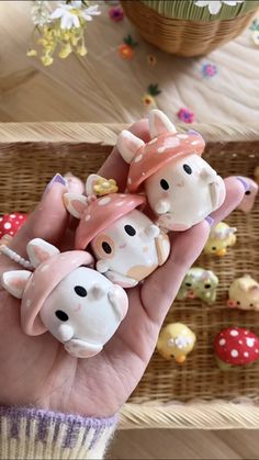 three little pigs are in the palm of someone's hand