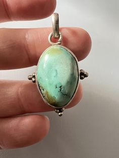 Vintage Native American Sterling Silver Light Green Blue Turquoise Pendant 1.4" | eBay Turquoise Necklace With Large Round Stone, Untreated Oval Blue Turquoise Necklace, Blue Turquoise Necklace With Large Chrysocolla Pendant, Blue Turquoise Chrysocolla Necklace With Large Pendant, Turquoise Necklace With Large Chrysocolla Pendant, Green Oval Cabochon Turquoise Necklace, Blue Chrysocolla Jewelry With Large Stone, Spring Wishlist, Silver Lights