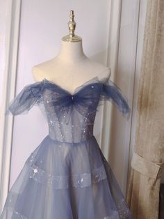 Blue Tulle Ball Gown For Homecoming, Blue Tulle Gown For Homecoming, Blue Off-shoulder Gown For Prom, Blue Tulle Evening Dress For Prom, Off-shoulder Tulle Gown For Formal Occasions, Blue Tulle Prom Evening Dress, Blue Tulle Ball Gown For Prom, Blue Strapless Tulle Evening Dress, Strapless Blue Tulle Evening Dress