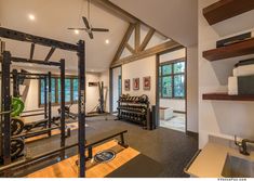 a home gym is shown in the middle of an open floor plan with lots of space