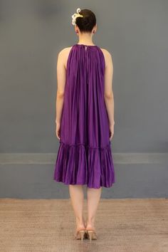 Purple halter neck tiered dress with pleated details. - Aza Fashions Sleeveless Pleated Bodice Beach Dress, Flowy Sleeveless Pleated Dress, Sleeveless Pleated Flowy Dress, Sleeveless Halter Dress With Pleated Bodice For Summer, Flowy Ruched Sleeveless Tiered Dress, Purple Linen, Diana Penty, Luxury Sale, Fashion App