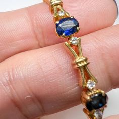 Oval Sapphire & Diamond XOXO Link Vintage Bracelet 18K Yellow Gold Blue Sapphire 4.20Ct Diamond G/H Color VS 0.40Ct 8.9gm 7.25" Long Thank you for visiting our shop! Visit our website DmKJewelry.com Also Follow us on Instagram https://www.instagram.com/dmkjewelry_/ Oval Sapphire Tennis Bracelet With 17 Jewels, Blue Oval Diamond Bracelet With Jewels, Oval Sapphire Diamond Bracelet, Luxury Blue Oval Diamond Bracelet, Oval Sapphire Gemstone Tennis Bracelet, Blue Oval Sapphire Diamond Bracelet, Sapphire Gemstone Tennis Bracelet With Oval Shape, Formal Blue Oval Diamond Bracelet, Classic Oval Sapphire Tennis Bracelet