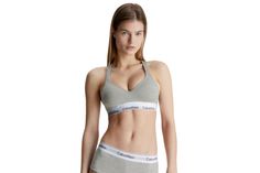 PRICES MAY VARY. LESS IS MORE: Unlined and underwire-free, this Calvin Klein bra combines the label’s famously sporty-sexy look with the feel of a favorite tee. MODERN COTTON: Spun in premium cotton yarns with silky modal and a hint of stretch, CK’s signature bras for women are lightweight, super-soft and breathable. EFFORTLESS: An easy, pullover raceback silhouette makes dressing stress-free. SUPER-SOFT: Smooth and lightweight, this wireless bra for women has an ultra-soft, flexible band that r Calvin Klein Fitted Sports Bra For Athleisure, Calvin Klein Fitted Athleisure Sports Bra, Calvin Klein Fitted Sports Bra, Calvin Klein Sporty Fitted Sports Bra, Calvin Klein Sports Bra, Calvin Klein Bra, Bra For Women, Everyday Bra, Wireless Bra