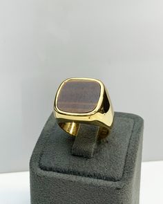 Men Ring with Tiger Eyes Gemstone, Brown Pinky Signet Ring, Square Shape, Stylish Gold / Silver Ring, Handmade Jewelry, Best Gift for Him ◎ Details ◎ ○ Material 14K Solid Gold or 925 Sterling Silver Weight of Ring : approx 18.00 gr Height of Ring : approx 5.30 mm ○ Upgrade to Solid 18K Gold, please click the link below: https://www.etsy.com/listing/962826004 ○ Gemstone Natural Tiger Eyes approx. 15 mm x 15 mm 4.00 ct Made to Order HANDMADE ITEM ○ For Men Collection : https://etsy.me/2PmKJMW All Luxury Brown Signet Ring For Formal Occasions, Classic Brown Signet Ring For Anniversary, Luxury Brown Rings As Gifts, Elegant Formal Brown Signet Ring, Brown Polished Finish Signet Ring For Formal Occasions, Luxury Brown Rings For Gift, Formal Brown Jewelry With Polished Finish, Luxury Brown Ring For Gift, Brown Polished Finish Signet Ring For Anniversary