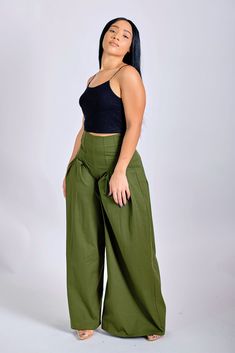 Go green. Green for these high right, wide-leg flare pants with front and back pleat detailing and zipper closure. These pants will flatter any body shape! Pair with a cute crop top and when everyone asks where you got these from, please send them our way! CONTENT & CARE Hand wash with cold water Hang to dry Do not bleach Cotton/Polyester DEETS & FIT Model is wearing a size Medium Fabric has some stretch Model profile: Stacy is 5'4" and measures 34 (bust) 28 (waist) and 40 (hips) Versatile Green Cargo Pants For Spring, Green High Waist Wide Leg Pants With Pockets, Versatile Green High-waisted Wide Leg Pants, Casual Green Flare Pants, Versatile Green Wide Leg Straight Pants, Versatile Green Straight Wide Leg Pants, High-waisted Green Wide Leg Pants With Pockets, Fitted Green Cargo Pants For Summer, Versatile High Waist Green Pants