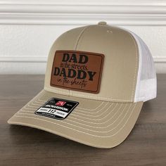 Unleash the dad jokes with this funny and lighthearted hat! It's the perfect accessory to sprinkle some humor into his wardrobe. 😄 Specifications: 🧢 Richardson original 112 trucker; adjustable for the perfect fit 🎩 60/40 cotton/polyester blend for comfort 📏 One size fits most 🏷️ Expertly laser engraved leatherette patch design 📦 Ships in 2 to 3 business days from our Orlando Studio Care Instructions: 🚫 Do not wash; spot clean only Please Note: 🌈 Colors may vary from photos based on your Adjustable White Trucker Hat With Leather Patch, White Trucker Hat With Leather Patch, Adjustable White Leather Hat, White Adjustable Leather Hat, White Adjustable Baseball Cap For Father's Day, Adjustable Brown Baseball Cap With Letter Print, Father's Day Casual Adjustable Snapback Hat, Funny White Adjustable Baseball Cap, Adjustable Snapback Hat For Father's Day