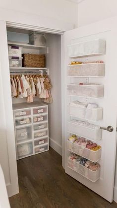 an organized closet with clothes and other items