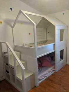 there is a loft bed with stairs in the room