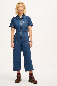 Ragan Jumpsuit: ORGANIC DENIM - Mid Wash Blue – Lucy & Yak Medium Wash Mid-rise Denim Jumpsuit, Casual Mid-rise Cotton Denim Jumpsuit, Lucy And Yak Boilersuit, Relaxed Fit Mid-rise Denim Jumpsuit, Mid-rise Cotton Denim Jumpsuit In Relaxed Fit, Lucy Yak, Emily J, Lucy And Yak, Boiler Suit