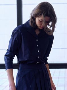 This is an open collar style shirt. This is an item that can be worn casually as it has an outer pocket on the chest and neat stitching details. The narrow style without cuffs on the sleeves creates a bit of volume and creates an elegant mood.- Sleeves have slits for roll-up styling- Opens and closes with round buttons that match the design- Various styling possible with slits on the side Open Collar Shirt, Stitching Details, Round Button, Style Shirt, Roll Up, Up Styles, Collar Shirts, Collar Style, Shirt Style