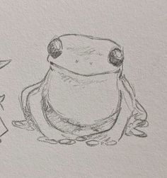 a drawing of a frog sitting next to a person with a hat on their head