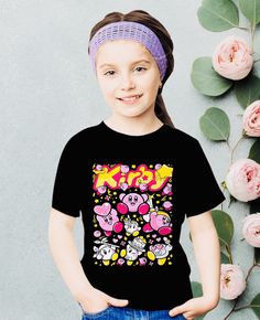 The kids heavy cotton tee is perfect for everyday use. The fabric is 100% cotton for solid colors. Polyester is included for heather-color variants. These fabrics are prime materials for printing. The shoulders have twill tape for improved durability. The collar is curl resistant due to ribbed knitting. There are no seams along the sides.  .: Made with 100%, midweight (5.3 oz/yd² (180 g/m US cotton that feels soft to the touch and a great choice for any season. .: The crew neckline along with the tee's classic fit, deliver a timeless style that is perfect for daily use. .: All t-shirts come with pearlized, tear-away labels for total comfort and a scratch-free experience. .: Made using ethically grown and harvested US cotton. Gildan is also a proud member of the US Cotton Trust Protocol ens Kawaii T-shirt With Cartoon Print For Fans, Kawaii Cartoon Print T-shirt For Fans, Cotton Cartoon Print Tops, Cartoon Style Cotton Top With Letter Print, Cotton Cartoon Style Tops With Letter Print, Cotton Cartoon Character Print Tops, Cotton Cartoon Tops With Character Print, Cotton Tops With Cartoon Character Print, Cartoon Character Print Short Sleeve Tops