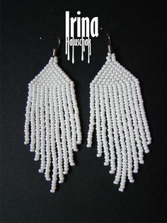 Beautiful beaded modern white earrings with fringe. Very lightweight. Measurements: Length - 7 cm Width - 2,5 сm Materials: Silver plated ear hooks Czech glass beads Nylon Thread Patience and Creativity .. ready to be given away ! Contact me if you have any questions. I will be happy to answer :) More necklaces from glass or stones: https://www.etsy.com/shop/IrinaHaluschak?ref=seller-platform-mcnav§ion_id=17111035 Beaded earrings: https://www.etsy.com/shop/IrinaHaluschak?ref=seller-platform-mcna White Beaded Earrings, Beautiful Beaded Earring, Jewelry Sets Handmade, Beaded Jewlery, Beaded Tassel Earrings, Beaded Wedding, Bead Work Jewelry, Beaded Drop Earrings, White Earrings