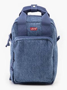 Meet the fun-sized version of our iconic L-Pack. With just the right amount space for your day-to-day essentials, the L-Pack Mini Backpack is your perfect all-day bag. We constructed this backpack with a modern square silhouette from durable, recycled 600-denier fabric and finished it off with loads of compartments for all your organizational needs. A fun-sized version of our iconic L-Pack Easy-access front pocket at exterior with organizational slots and pocket holsters Padded back panel and ad Mens Jeans Guide, Ribcage Jeans, Mini Mochila, Mini Accessories, Fun Sized, Blue Backpack, Levis Women, Jeans Bootcut, Boys Jeans