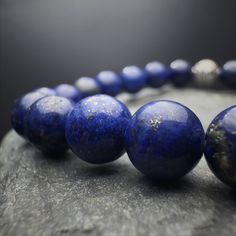 8mm Natural Rare Lapis Lazuli Beaded Bracelet | Mens  Womens Lapis Lazuli Gemstone Bracelet | Stretch Cord | 925 Sterling Silver | The Inner Vision Stone Indulge in the rare beauty of our Lapis Lazuli Beaded Bracelet, a true embodiment of resilience. Crafted with natural 8mm Lapis Lazuli gemstone beads, this bracelet not only complements your style but also channels the energies of the throat and third eye chakras. ⭐ PRODUCT DETAILS ⭐ - Natural Lapis Lazuli beads, - Stone size: Lapis Lazuli 8-8, Polished Beads Lapis Lazuli Bracelets, Polished Beads Lapis Lazuli Round Bracelets, Round Lapis Lazuli Bracelets With Polished Beads, Lapis Lazuli Beaded Bracelets With Polished Round Beads, Lapis Lazuli Beads, Lapis Lazuli Gemstone, Bracelet Mens, Lapis Lazuli Stone, Mens Beaded Bracelets