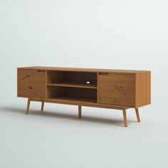 the sideboard is made from wood and has two drawers on one end, and an open drawer on the other