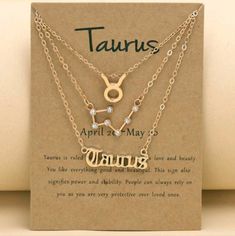 two necklaces with the word taurus written on them and an astrological zodiac sign