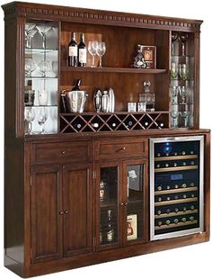 a wooden cabinet with wine glasses and bottles