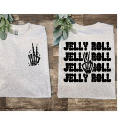 Cute Design ! Custom Made And Will Ship Within A Few Days! On Gildan Unisex Short Sleeve Check Out My Page For More Designs Jelly Roll Shirt Ideas, Jelly Roll Shirts, Fun Christmas Shirts, Preppy Things, Skeleton Hand, Black Sparkle, Pumpkin Shirt, Mom Tees, Jelly Roll