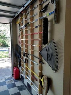 a garage with tools hanging on the wall