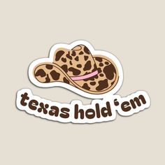 a sticker with the word texas hold'em on it and a cowboy hat