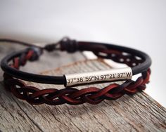 Personalized Men Leather Bracelet, Men Coordinate Gifts, Men leather jewelry, Silver, Coordinates, dad, adjustable, Christmas, Mens Gifts Custom hand stamped Bracelet, Personalized any information on the bracelet, the best gift for boyfriend or girlfriend, best friends, mom, dad etc. unisex style. Details: End: adjustable to any wrists Color of the leather: Brown / Black Raw materials: Real leather+metal Metal color: Stainless steel Max characters: 17 per line To see more different styles handmade bracelets, click https://www.etsy.com/shop/HandmadeGhost If you like my shop, just fav it, if you want the bracelets, you can add to your shopping cart. Any problem, just inquiry directly from the home page of my shop https://www.etsy.com/shop/HandmadeGhost Great day! Adjustable Engraved Leather Jewelry, Masculine Braided Leather Bracelet For Gift, Masculine Brown Jewelry For Gift, Masculine Brown Jewelry Gift, Brown Leather Bracelet With Engraving Option, Adjustable Leather Bracelet With Engraving Option For Father's Day, Father's Day Engraved Adjustable Braided Bracelets, Father's Day Adjustable Engraved Braided Bracelets, Father's Day Adjustable Engraved Leather Bracelet