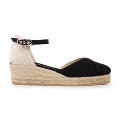 "100% Vegan, Organic and Sustainable. Authentic Espadrilles, Handcrafted by Artisans. Designed in Barcelona, Made in Spain These organic cotton canvas espadrilles with a 2\" inch low wedge heel are inspired by the Mediterranean and designed for breathability, comfort, and style. Made in Spain, these are an authentic pair of exquisite, espadrilles - made by artisans who preserve centuries-old traditions of shoemaking. * Lightweight Summer Espadrilles * Authentic. Made by artisans in Spain * Desig