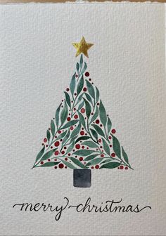 a christmas card with a watercolor painting of a tree on it's side