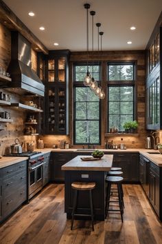 a kitchen with wooden floors and dark cabinets