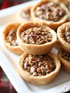 mini pecan pies on a white plate