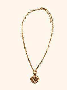 The Roman Coin Necklace combines a delicate gold link 18 kt. Gold plated chain and a detailed Roman coin pendant, exuding sophistication and historical charm. Each intricate link in the chain complements the intricacies of the coin, creating a timeless and refined accessory perfect for any occasion. 18 Inches in length +2 inch extender Complete your look with The G Necklace. Vintage Gold-tone Chain Necklace With Coin Pendant, Gold-tone Medallion Necklace With Coin Pendant, Luxury Gold Chain Medallion Necklace, Luxury Gold Chain Necklace With Medallion, Elegant Gold-tone Medallion Necklace With Gold Chain, Luxury Gold Coin Medallion Necklace, Luxury Gold Plated Medallion Necklace, Luxury Gold Medallion Locket Necklace, Luxury Gold Medallion Necklace