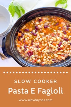 slow cooker pasta e fagioi in a crock pot on a table