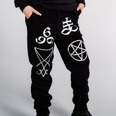 Unisex "Jogger" Style Sweatpants from Forbidden Alchemy. Designed for both comfort and style, these slim-fitting joggers feature a tapered ankle for a sleek silhouette that flatters all body types. Crafted from a premium blend of 80% cotton and 20% polyester, they offer the perfect balance of softness and durability, ensuring all-day comfort and long-lasting wear. Slim Fit: Tailored to hug your body while allowing ease of movement. Tapered Ankle: Provides a modern, streamlined look. Premium Fabr Relaxed Fit Hip Hop Pants For Jogging, Stretch Sweatpants With Elastic Waistband For Streetwear, Hip Hop Style Stretch Bottoms For Jogging, Hip Hop Tapered Leg Sweatpants For Streetwear, Hip Hop Style Tapered Leg Sweatpants For Streetwear, Hip Hop Stretch Bottoms For Jogging, Stretch Hip Hop Bottoms For Jogging, Fitted Cotton Joggers For Streetwear, Hip Hop Cotton Bottoms For Jogging