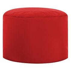 a red round ottoman sitting on top of a white floor