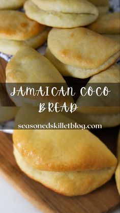 some food that is on top of a cutting board with the words jamaican coco bread