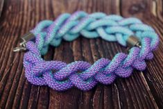 "Braided Wide Chain Necklace, double-sided purple turquoise necklace made of czech beads. The color of the necklace is perfect for summer, it will suit your any dress or denim style. It is interesting and bright at the same time. This is the perfect stylish original accessory for you or your friends. This is a great idea for a birthday present or any other occasion. Available in a different colour and size, just contact me If you have any questions regarding this item, please hit the \"Ask a Que Handmade Purple Necklaces For Beach, Handmade Purple Beach Necklaces, Purple Single Strand Bohemian Beaded Necklace, Bohemian Purple Single Strand Beaded Necklace, Handmade Turquoise Lariat Necklace Gift, Purple Multi-strand Beaded Necklace, Handmade Purple Multi-strand Beads, Handmade Purple Beaded Pendant Necklace, Handmade Purple Pendant Beaded Necklace