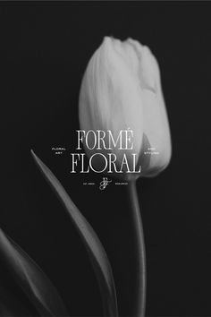 a white tulip with the words forme floral on it's back side