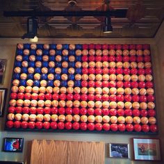 a large american flag made out of balls