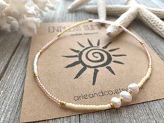 Dainty Freahwater Pearls Cream Anklet Bracelet, Minimalist and Dainty Anklet Bracelet, Beaded Stretc Cream Bracelets For Summer Gift, Cream Bracelets As Summer Gift, Dainty Handmade Anklets For Beach, Adjustable Cream Pearl Beaded Bracelets, Adjustable Cream Pearl Beaded Bracelet, Handmade White Beachy Anklets, Dainty Hypoallergenic Adjustable Anklets, Dainty White Beaded Anklets, White Anklets With Pearl Charm As Gift