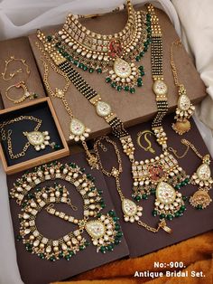 an assortment of jewelry is displayed on display