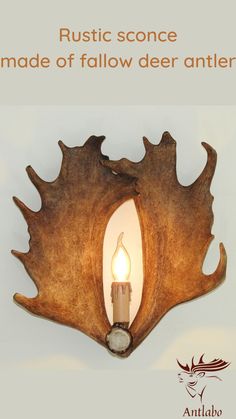 Double fallow deer antler sconce. Bulb holder looks like a candle, so it looks great with bulb, which looks like a flame Antler Wall Sconces, Deer Antler Chandelier, Antler Wreath, Antler Lights, Antler Wall, Fallow Deer, Antler Chandelier, Small Chandelier, Large Chandeliers