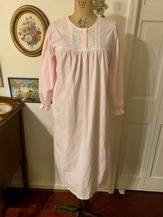 Brand new with tags Deadstock vintage Amanda Stewart nightgown from Sears circa the 90s. Size on tag is Petite Large or PL.  Measurements taken with nightgown lying flat: Pit to pit: 20 inches  Free waist  Top to bottom: 44 inches  Super soft from my smoke free, cat friendly home. Pink Cotton Nightgown With Lace Trim, Pink Nightgown With Lace Trim For Bedtime, Pink Lace Trim Nightgown For Loungewear, Pink Lace Trim Chemise For Daywear, Pink Lace Trim Chemise For Bedtime, Pink Lace Trim Chemise For Sleepover, Pink Lace Trim Chemise, Cottagecore Nightgown With Lace Trim For Bedtime, Cottagecore Sleepwear With Lace Trim For Home