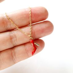 "Beautiful and lovely red high heel charm necklace. Made of red enamel ladies high heel charm with a skinny gold plated brass chain. Soft and simple. Great for gift, everyday or special occasion.  Your item will ship in a gift box. Please feel free to contact me if you have any questions. ♥ Length  14\" - 20\" chain ♥ High heel charm 3/8\" x 5/8\"  ♥ Gold plated over brass / Black Enamel ♥  See more Rudiana Accessories  Rudiana.etsy.com" High Heel Necklace, Red High Heels, Necklace Red, Gift Graduation, Shoe Charms, Brass Chain, Red Shoes, Black Enamel, Womens High Heels