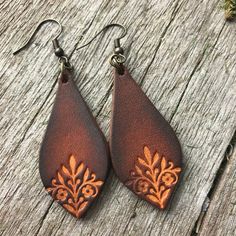 Hand Tooled Fancy Teardrop Caramel and Chocolate Brown Leather | Etsy Rustic Hand Tooled Leather Earrings, Handmade Rustic Leather Earrings, Handmade Brown Leather Earrings, Handmade Leather Brown Earrings, Handmade Rust Leather Jewelry, Artisan Brown Teardrop Earrings, Brown Leather Earrings For Gift, Artisan Brown Hand Tooled Earrings, Artisan Brown Hand Painted Earrings