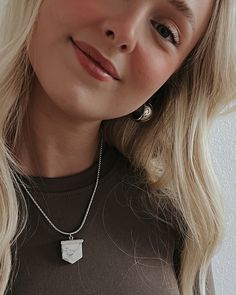 Alicia is a fun silver and marble pendant necklace that is easy to wear and layer! • Length: 16" + 2" chain extender• Waterproof Chain• Tarnish resistant• Stainless steel• HypoallergenicCare tips:• Store jewelry in our cloth Béljoy bag or a small plastic zip lock• Use a jewelry cloth to clean everyday oils off• Avoid contact with chemicals such as hairspray, lotions, perfumes, etc. Trendy Nickel-free Sterling Silver Charm Necklaces, Casual Everyday Jewelry With Silver Chain, Casual Everyday Silver Chain Jewelry, Trendy Silver Charm Necklace For Everyday, Trendy Silver Charm Necklace With Round Pendant, Casual Everyday Necklace With Silver Chain, Casual Silver Chain Necklace For Everyday Wear, Casual Everyday Silver Chain Necklace, Trendy Sterling Silver Charm Necklaces For Everyday