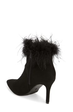 Fluffy feathers top this fabulous night-out bootie balanced by a pointed toe and wrapped stiletto heel. 3 1/2" heel 4 1/2" shaft Side zip closure Textile or synthetic upper/synthetic lining and sole Imported Pointed Toe Heels With Feather Trim For Evening, High Heels With Feather Trim For Night Out, Elegant Pointed Toe Heels With Feathers, Feather Heels Nordstrom, Evening Heels With Feather Trim, Pointed Toe, Feather Tops, Black Suede, Stiletto Heels, Night Out