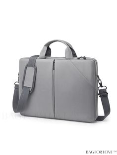 a gray laptop bag sitting on top of a white table