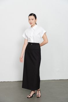 This skirt brings sophisticated style to your wardrobe. Crafted from a durable wool blend, this ankle length skirt offers timeless style for any occasion. With sleek, clean lines and smart welt pockets, this skirt ensures a polished look with unbeatable comfort. Tailored Long Skirt For Work, Workwear Long Lined Pencil Skirt, Fitted Classic Maxi Skirt For Workwear, Long Lined Pencil Skirt For Workwear, Long Pencil Skirt For Workwear, Classic Black Maxi Skirt For Work, Elegant Long Pencil Skirt For Daywear, Elegant Long Pencil Skirt, Classic Asymmetrical Skirt For Work