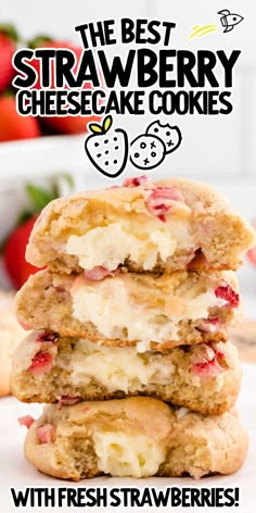 strawberry cheesecake cookies stacked on top of each other with fresh strawberries in the background