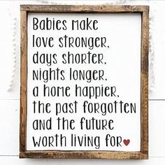 a wooden framed sign with the words babies make love longer, days shorter, nights longer, a bone harper, the past forgotten and the future worth living for